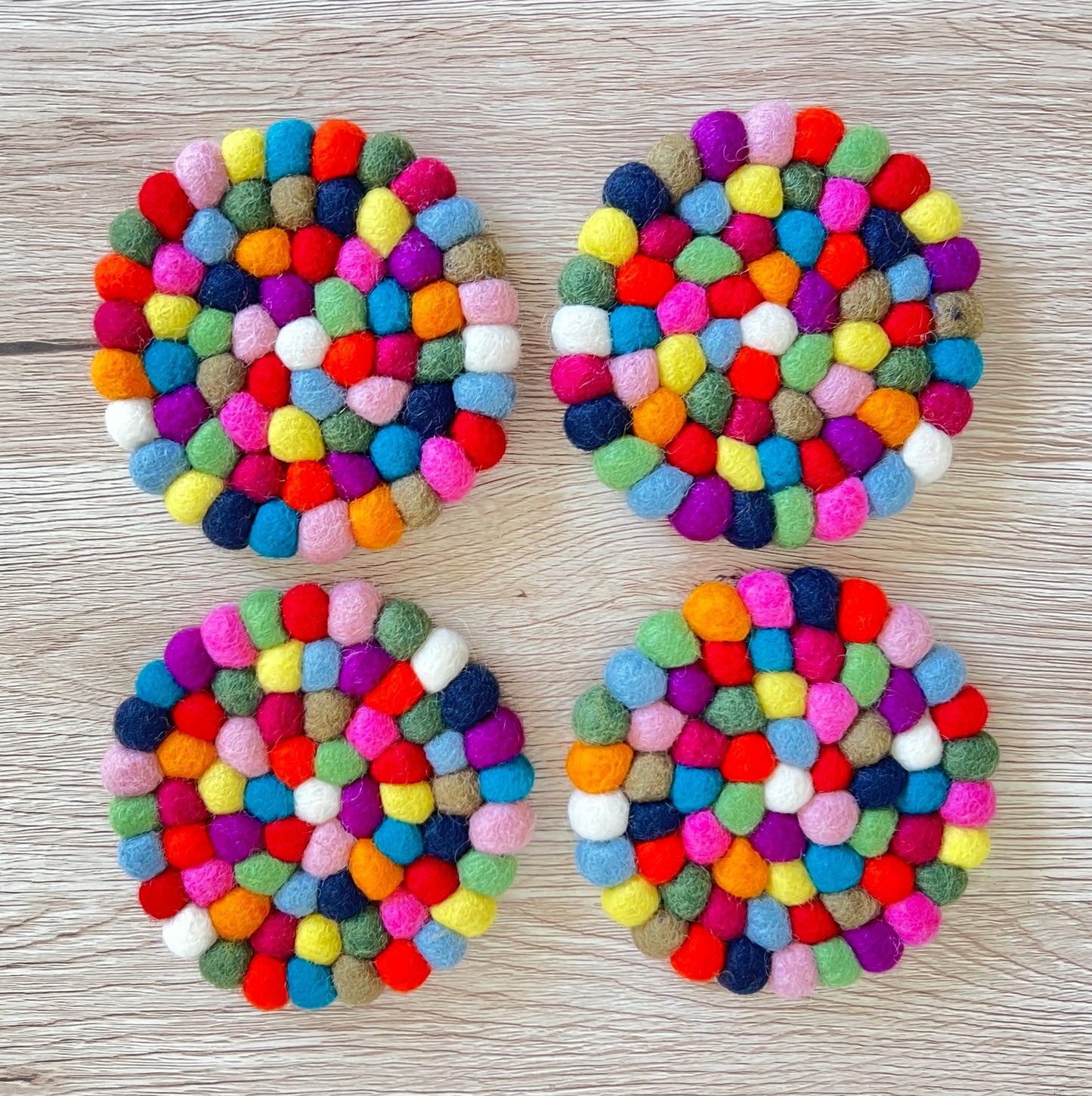 Rainbow Felt Ball Coasters – Handmade Wool Drink Mats
